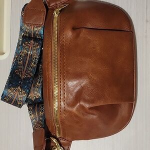 Elegant Tan Crossbody Bag with Patterned Strap